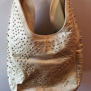 Gold handbag with jewel accents
